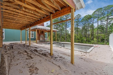 Step into refined coastal luxury with the Suffolk II, an on Origins Golf Club in Florida - for sale on GolfHomes.com, golf home, golf lot