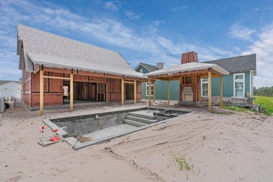 Step into refined coastal luxury with the Suffolk II, an on Origins Golf Club in Florida - for sale on GolfHomes.com, golf home, golf lot