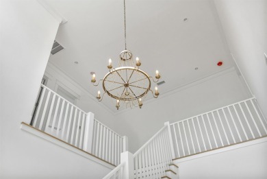 Step into refined coastal luxury with the Suffolk II, an on Origins Golf Club in Florida - for sale on GolfHomes.com, golf home, golf lot