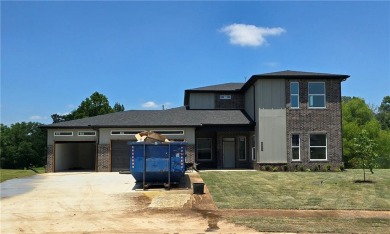 Near completion golf-front home in Pea Ridge located along a on Big Sugar Golf Club in Arkansas - for sale on GolfHomes.com, golf home, golf lot