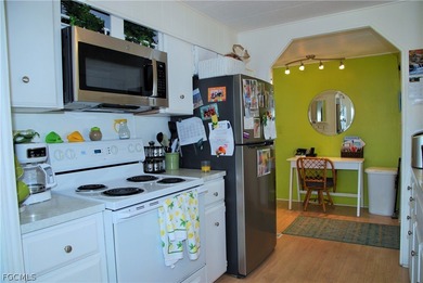 Updates galore in this turnkey retreat located in Six Lakes on Six Lakes Country Club in Florida - for sale on GolfHomes.com, golf home, golf lot