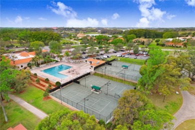 Nestled within the exclusive, gated enclave of Lake Jovita, this on Lake Jovita Golf and Country Club in Florida - for sale on GolfHomes.com, golf home, golf lot