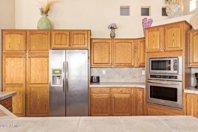 Discover your dream home with breathtaking views of the 5th hole on Oakwood Golf Club  in Arizona - for sale on GolfHomes.com, golf home, golf lot