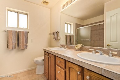 Discover your dream home with breathtaking views of the 5th hole on Oakwood Golf Club  in Arizona - for sale on GolfHomes.com, golf home, golf lot