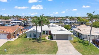 Welcome to Your Waterfront Dream Home at 4918 Forecastle Dr in on Gulf Harbors Golf Course in Florida - for sale on GolfHomes.com, golf home, golf lot