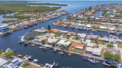 Welcome to Your Waterfront Dream Home at 4918 Forecastle Dr in on Gulf Harbors Golf Course in Florida - for sale on GolfHomes.com, golf home, golf lot