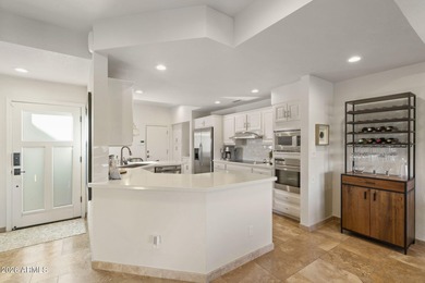 Enjoy luxury living in this beautifully remodeled townhome in on Gainey Ranch Golf Club in Arizona - for sale on GolfHomes.com, golf home, golf lot