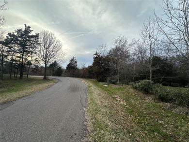 Wooded 1-acre lot only a golf cart away from golfing! on Sulphur Springs Country Club in Texas - for sale on GolfHomes.com, golf home, golf lot