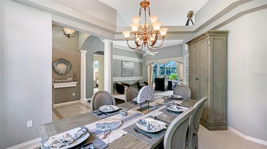 Welcome to this single-story home in the gated community of on University Park Country Club in Florida - for sale on GolfHomes.com, golf home, golf lot