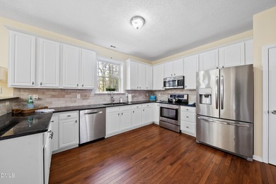 Beautifully maintained home is situated on a large lot next to a on The Crossings at Grove Park in North Carolina - for sale on GolfHomes.com, golf home, golf lot