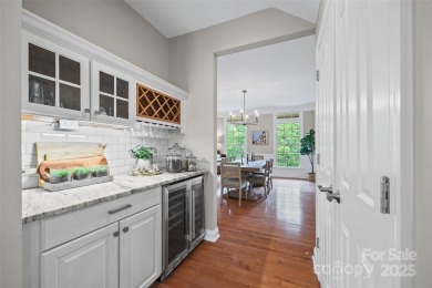 Welcome to this stately full-brick home in the heart of Tega on Tega Cay Golf Club in South Carolina - for sale on GolfHomes.com, golf home, golf lot