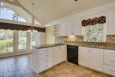 This contemporary stone and cedar West Lake home is nestled on a on West Lake Country Club in Georgia - for sale on GolfHomes.com, golf home, golf lot