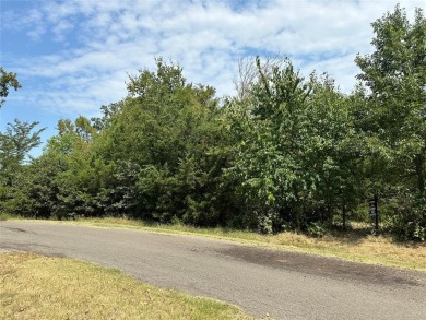 Wooded 1-acre lot only a golf cart away from golfing! on Sulphur Springs Country Club in Texas - for sale on GolfHomes.com, golf home, golf lot