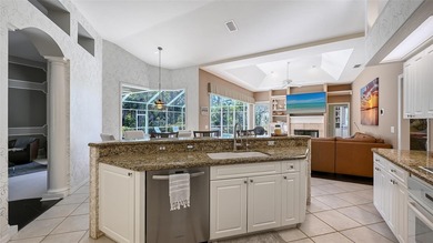 Welcome to this single-story home in the gated community of on University Park Country Club in Florida - for sale on GolfHomes.com, golf home, golf lot