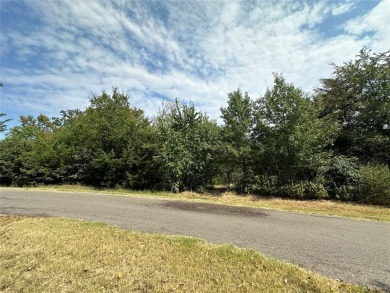 Wooded 1-acre lot only a golf cart away from golfing! on Sulphur Springs Country Club in Texas - for sale on GolfHomes.com, golf home, golf lot