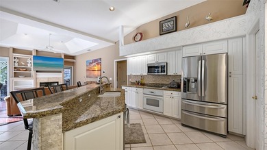 Welcome to this single-story home in the gated community of on University Park Country Club in Florida - for sale on GolfHomes.com, golf home, golf lot