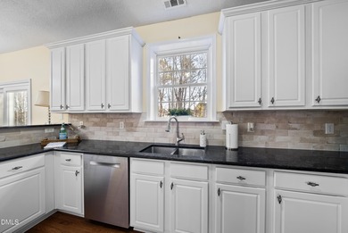 Beautifully maintained home is situated on a large lot next to a on The Crossings at Grove Park in North Carolina - for sale on GolfHomes.com, golf home, golf lot