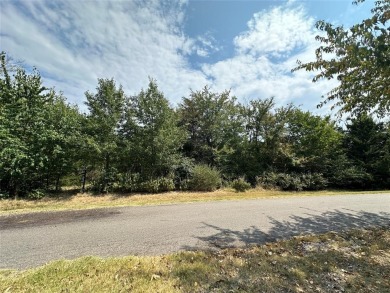 Wooded 1-acre lot only a golf cart away from golfing! on Sulphur Springs Country Club in Texas - for sale on GolfHomes.com, golf home, golf lot