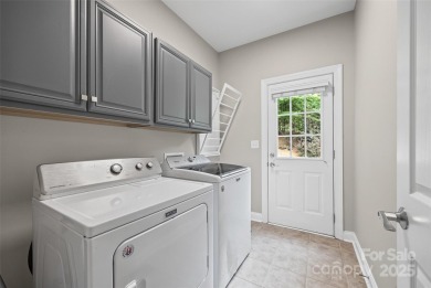 Welcome to this stately full-brick home in the heart of Tega on Tega Cay Golf Club in South Carolina - for sale on GolfHomes.com, golf home, golf lot