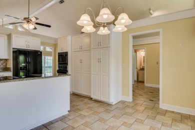 This contemporary stone and cedar West Lake home is nestled on a on West Lake Country Club in Georgia - for sale on GolfHomes.com, golf home, golf lot