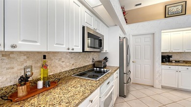 Welcome to this single-story home in the gated community of on University Park Country Club in Florida - for sale on GolfHomes.com, golf home, golf lot