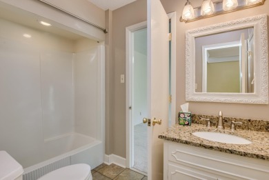 This contemporary stone and cedar West Lake home is nestled on a on West Lake Country Club in Georgia - for sale on GolfHomes.com, golf home, golf lot