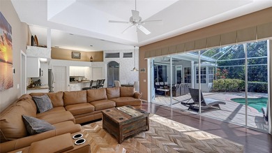 Welcome to this single-story home in the gated community of on University Park Country Club in Florida - for sale on GolfHomes.com, golf home, golf lot