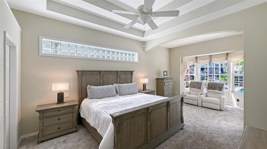 Welcome to this single-story home in the gated community of on University Park Country Club in Florida - for sale on GolfHomes.com, golf home, golf lot