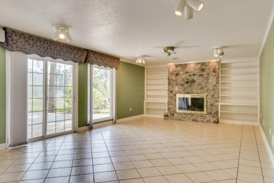 This contemporary stone and cedar West Lake home is nestled on a on West Lake Country Club in Georgia - for sale on GolfHomes.com, golf home, golf lot