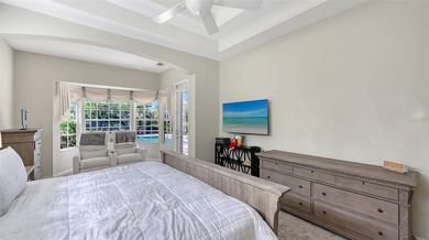 Welcome to this single-story home in the gated community of on University Park Country Club in Florida - for sale on GolfHomes.com, golf home, golf lot