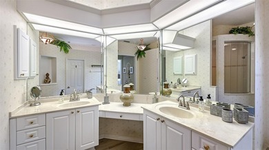 Welcome to this single-story home in the gated community of on University Park Country Club in Florida - for sale on GolfHomes.com, golf home, golf lot