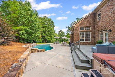 Welcome to this stately full-brick home in the heart of Tega on Tega Cay Golf Club in South Carolina - for sale on GolfHomes.com, golf home, golf lot