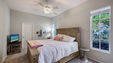 Welcome to this single-story home in the gated community of on University Park Country Club in Florida - for sale on GolfHomes.com, golf home, golf lot