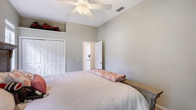 Welcome to this single-story home in the gated community of on University Park Country Club in Florida - for sale on GolfHomes.com, golf home, golf lot