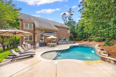 Welcome to this stately full-brick home in the heart of Tega on Tega Cay Golf Club in South Carolina - for sale on GolfHomes.com, golf home, golf lot