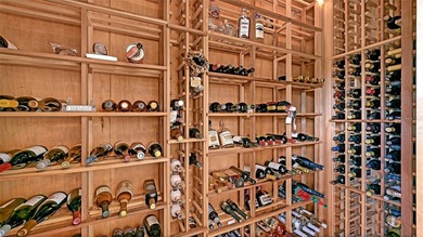 Welcome to this single-story home in the gated community of on University Park Country Club in Florida - for sale on GolfHomes.com, golf home, golf lot