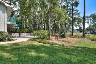 This contemporary stone and cedar West Lake home is nestled on a on West Lake Country Club in Georgia - for sale on GolfHomes.com, golf home, golf lot