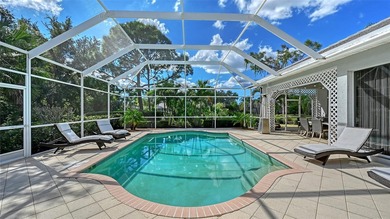 Welcome to this single-story home in the gated community of on University Park Country Club in Florida - for sale on GolfHomes.com, golf home, golf lot