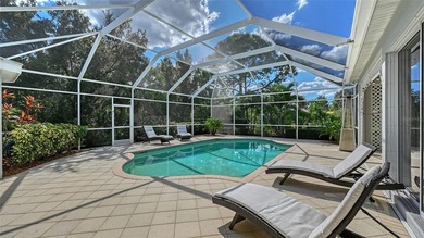 Welcome to this single-story home in the gated community of on University Park Country Club in Florida - for sale on GolfHomes.com, golf home, golf lot