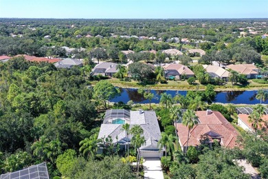 Welcome to this single-story home in the gated community of on University Park Country Club in Florida - for sale on GolfHomes.com, golf home, golf lot