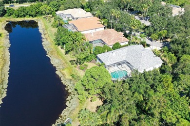 Welcome to this single-story home in the gated community of on University Park Country Club in Florida - for sale on GolfHomes.com, golf home, golf lot