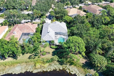 Welcome to this single-story home in the gated community of on University Park Country Club in Florida - for sale on GolfHomes.com, golf home, golf lot