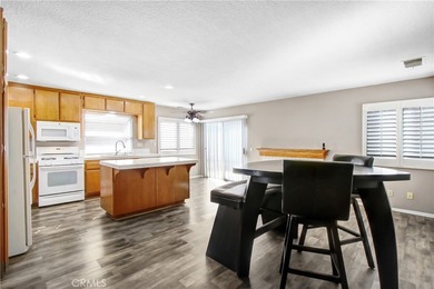 Discover this thoughtfully updated 3-bed, 3-bath home nestled in on Sun Lakes Country Club in California - for sale on GolfHomes.com, golf home, golf lot