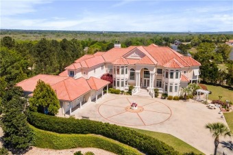 Gated custom built Mediterranean Estate sits privately elevated on Oakview Golf & Country Club in Georgia - for sale on GolfHomes.com, golf home, golf lot