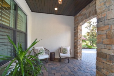 Nestled on the golf course & water in Parkland Golf & Country on Parkland Golf Club in Florida - for sale on GolfHomes.com, golf home, golf lot