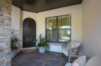 Nestled on the golf course & water in Parkland Golf & Country on Parkland Golf Club in Florida - for sale on GolfHomes.com, golf home, golf lot
