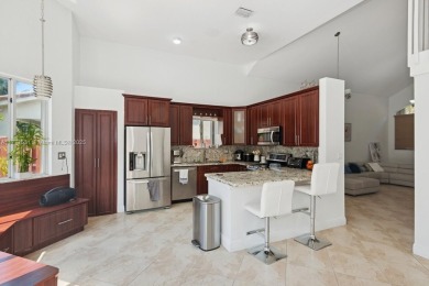 Large Pool and Patio to play in. Big fenced backyard is perfect on Keys Gate Golf Club in Florida - for sale on GolfHomes.com, golf home, golf lot