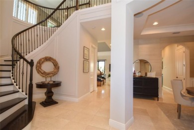 Nestled on the golf course & water in Parkland Golf & Country on Parkland Golf Club in Florida - for sale on GolfHomes.com, golf home, golf lot