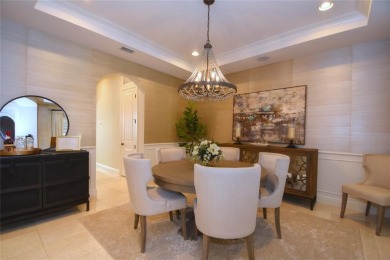 Nestled on the golf course & water in Parkland Golf & Country on Parkland Golf Club in Florida - for sale on GolfHomes.com, golf home, golf lot