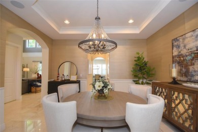 Nestled on the golf course & water in Parkland Golf & Country on Parkland Golf Club in Florida - for sale on GolfHomes.com, golf home, golf lot